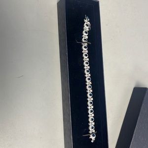 A beautiful sterling silver size 7.5 Sapphire tennis bracelet.